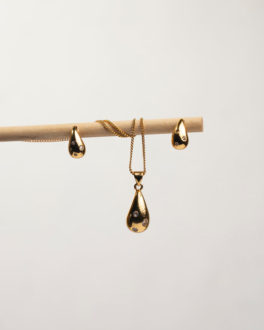 Gold Teardrop Pendant set with crystal accents